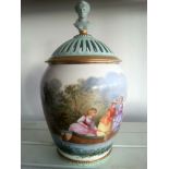 Exquisite antique Victorian porcelain lidded urn with figural finial and gilt detailing. Good