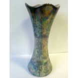 Scottish Campsie Ware lustre vase decorated in mottled blues and an iridescent glaze. Standing at