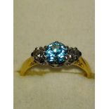 18 ct gold diamond and blue stone ring size 5
