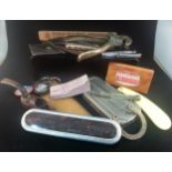 TRAY OF MISCELLANEOUS CURIOS To include a 1920s Rolls razor, pen knives, drawing tools, clog pipe,