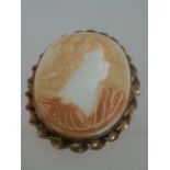 Large oval cameo brooch measures approx 5cm. Low cost delivery available on all items. This is a low