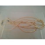 Pair of vintage faux pearl double string chokers. Low cost delivery available on all items. This