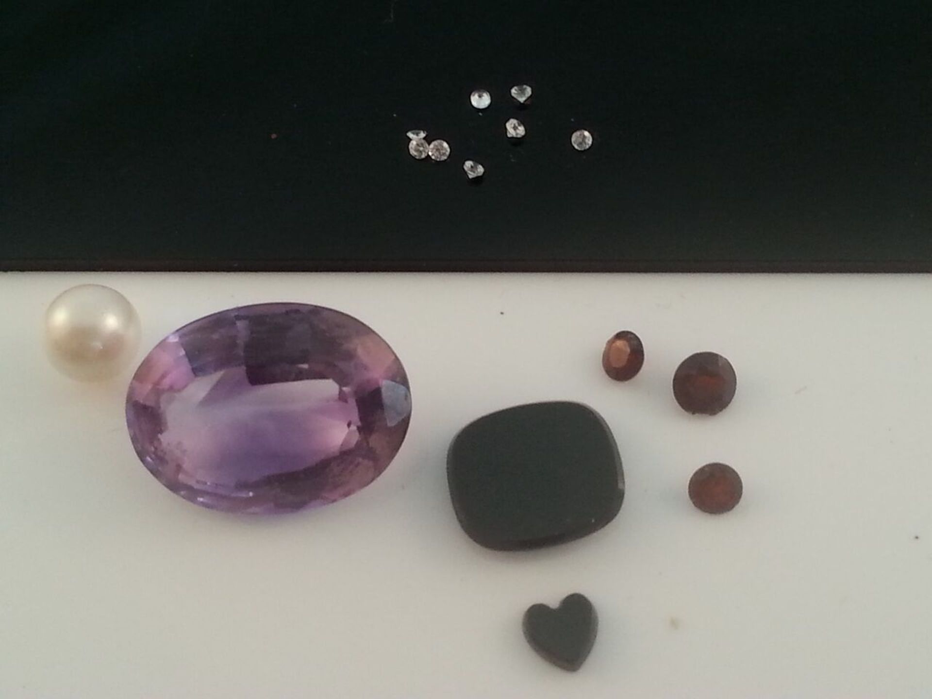 Group of various loose gem stones. Low cost delivery available on all items. This is a low start, no