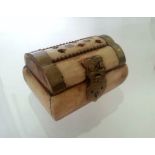 A BONE TRINKET BOX WITH BRASS FITTINGS. No obvious damage. Low cost delivery available on all items.