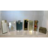 A COLLECTION OF 7 VINTAGE CIGARETTE LIGHTERS To include Ronson Zippo and Diplomat. Low cost delivery