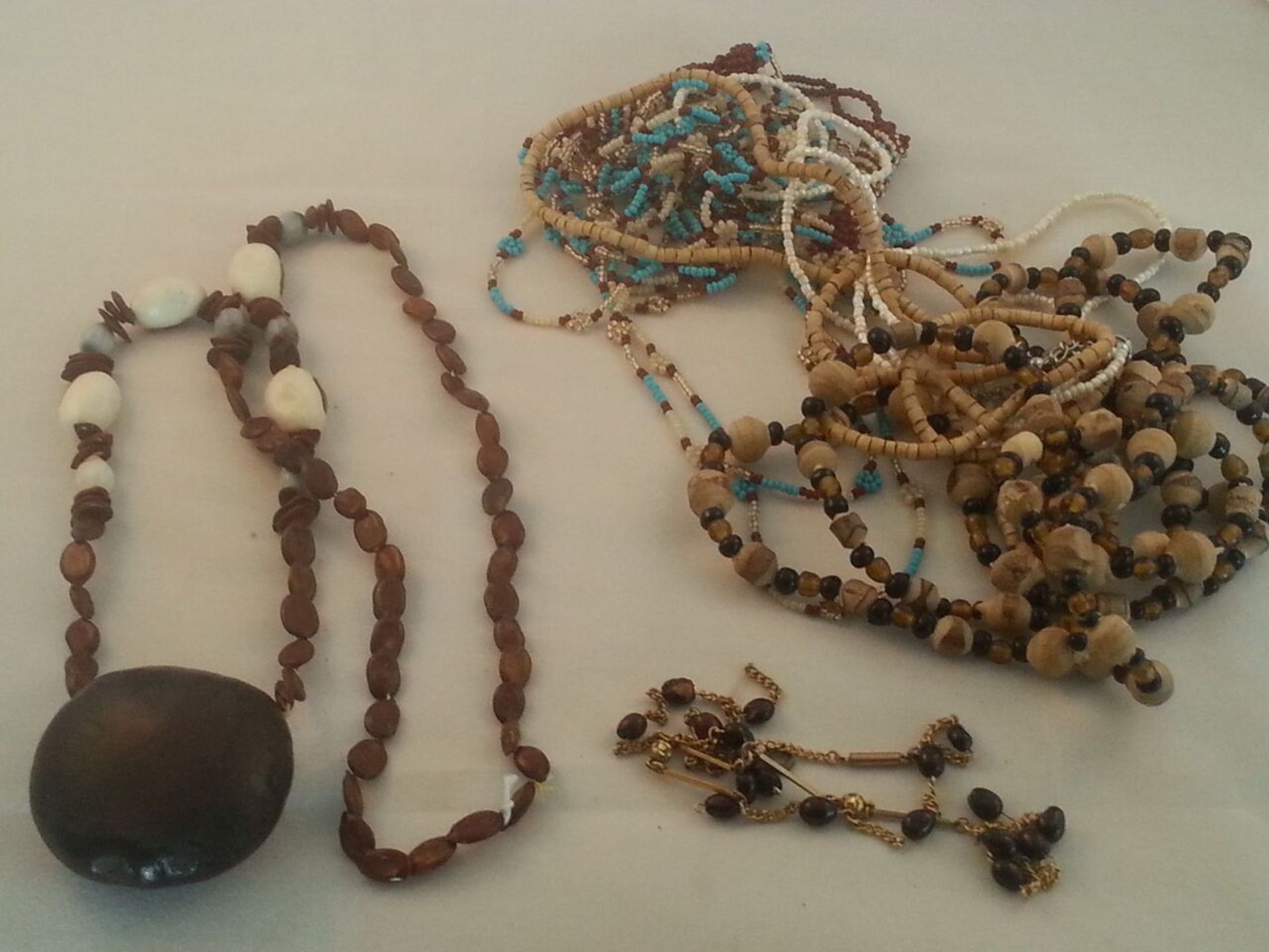 Group of tribal & other necklaces made from wood, beads, seeds & nuts Low cost delivery available on