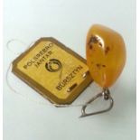 POLISH SILVER AND BUTTERSCOTCH AMBER PENDANT WITH LABEL. Low cost delivery available on all items.