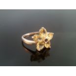 Sterling silver 925 daisy ring set with oval cut yellow citrine stones to form the petals and a