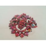 Large vintage brooch set with red stones. Approx 5cm Low cost delivery available on all items.