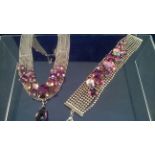 COSTUME JEWELLERY SET COMPRISING CHOKER AND BRACELET SET WITH LAGE PURPLE CRYSTALS. Low cost