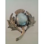 Scottish thistle brooch set with central agate type stone Low cost delivery available on all