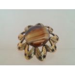 Large vintage flower brooch with central amber coloured stone, approx 5cm. Low cost delivery