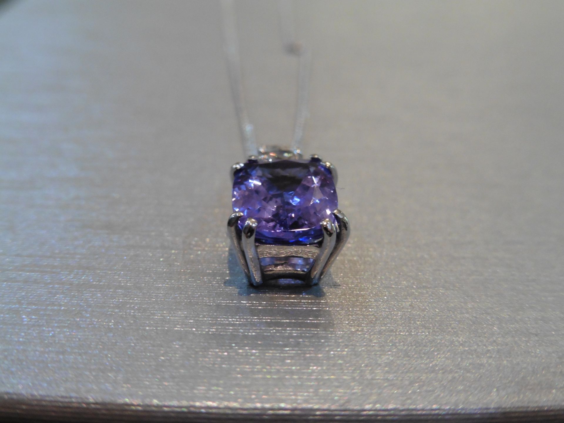 Brand new 18ct white gold Tanzanite and diamond pendant set with a 4.04ct emerald cut AAA - Image 3 of 3