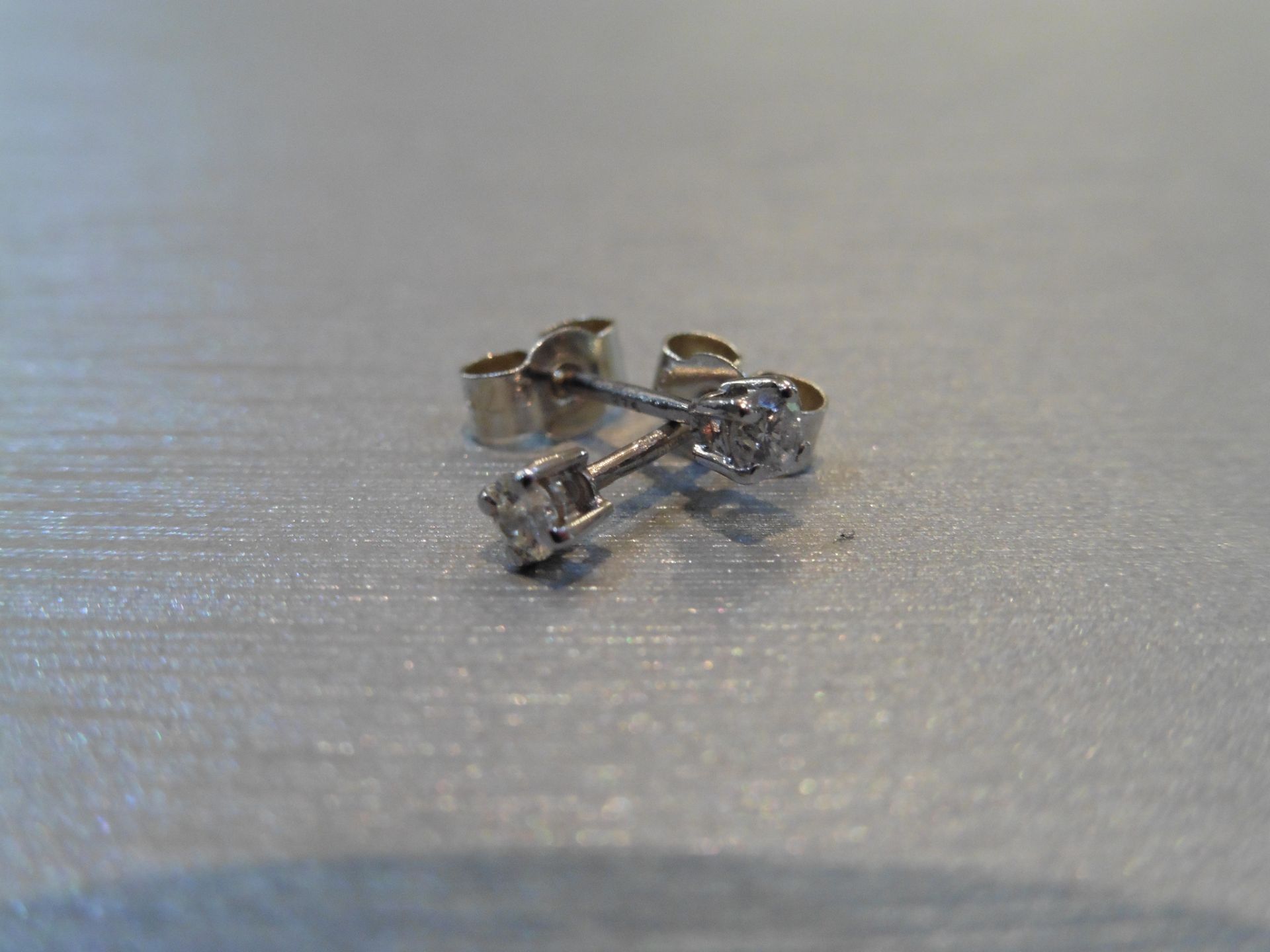 Brand new 9ct white gold solitaire stud earrings each set with a brilliant cut diamond weighing a - Image 3 of 3