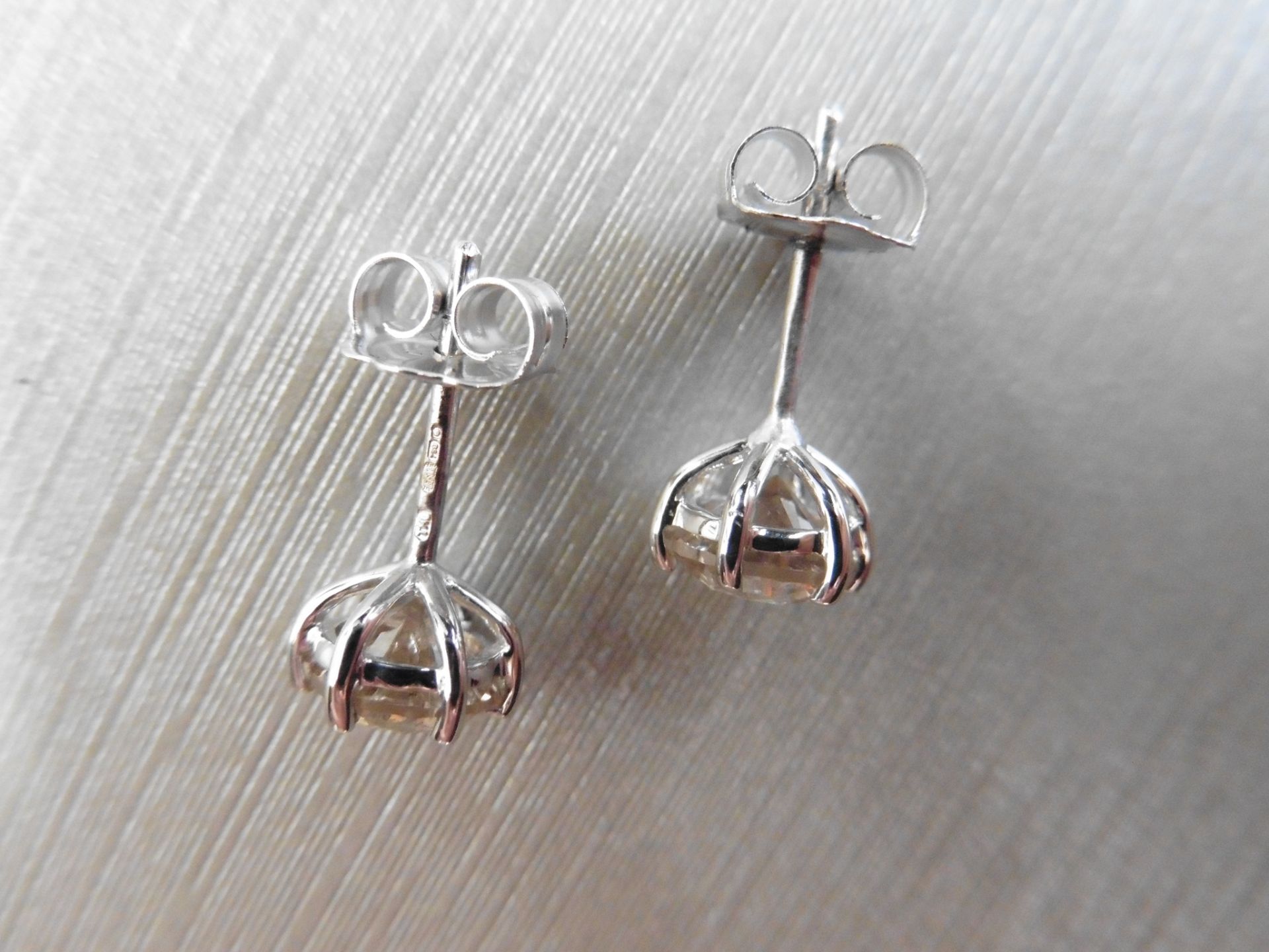 Brand new 18ct white gold diamond solitaire style earrings each set with a brilliant cut diamond. - Image 2 of 3