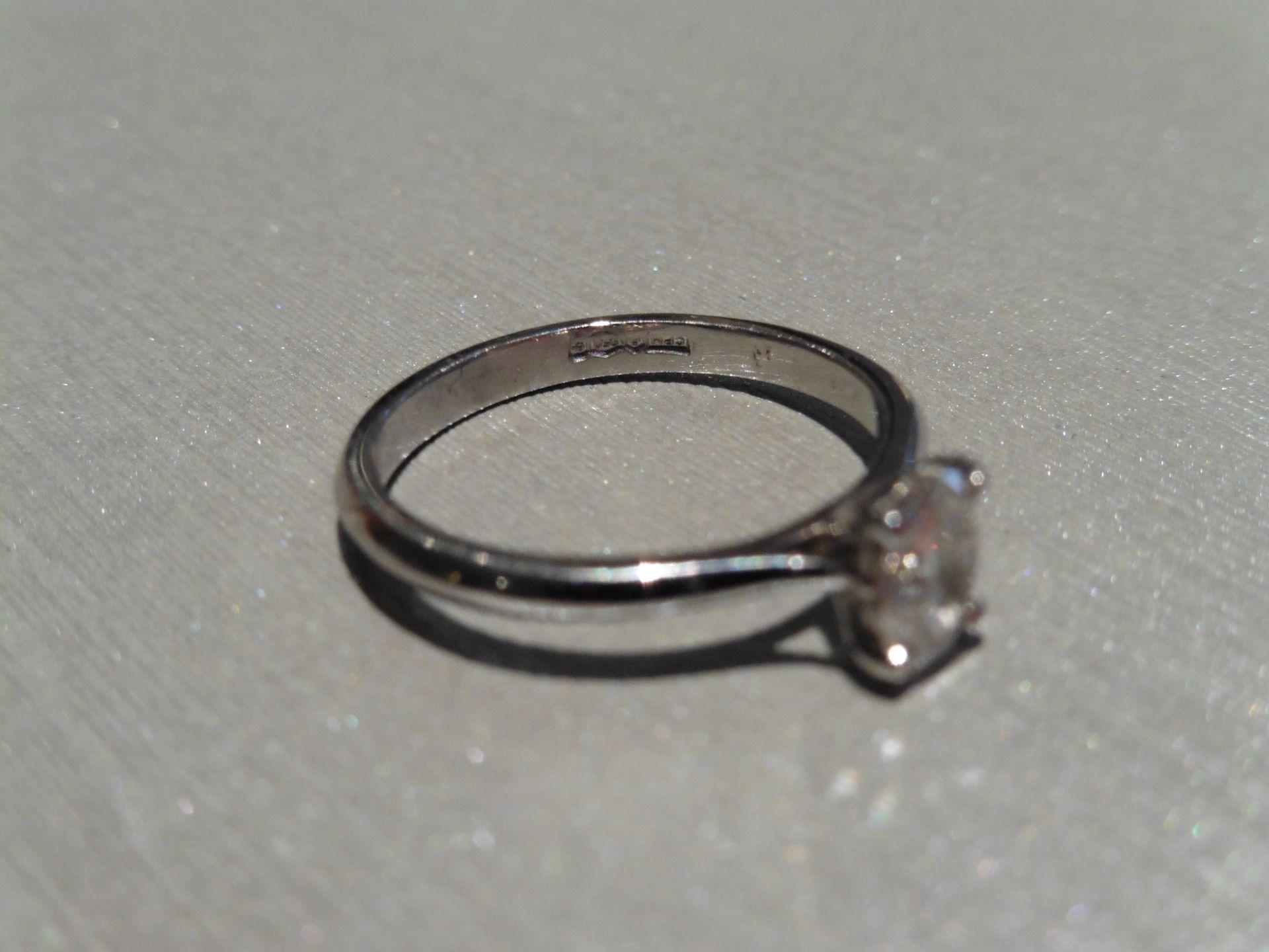 Brand new Platinum diamond solitaire ring set with a 0.41ct oval cut diamond, F colour and si2 - Image 2 of 4