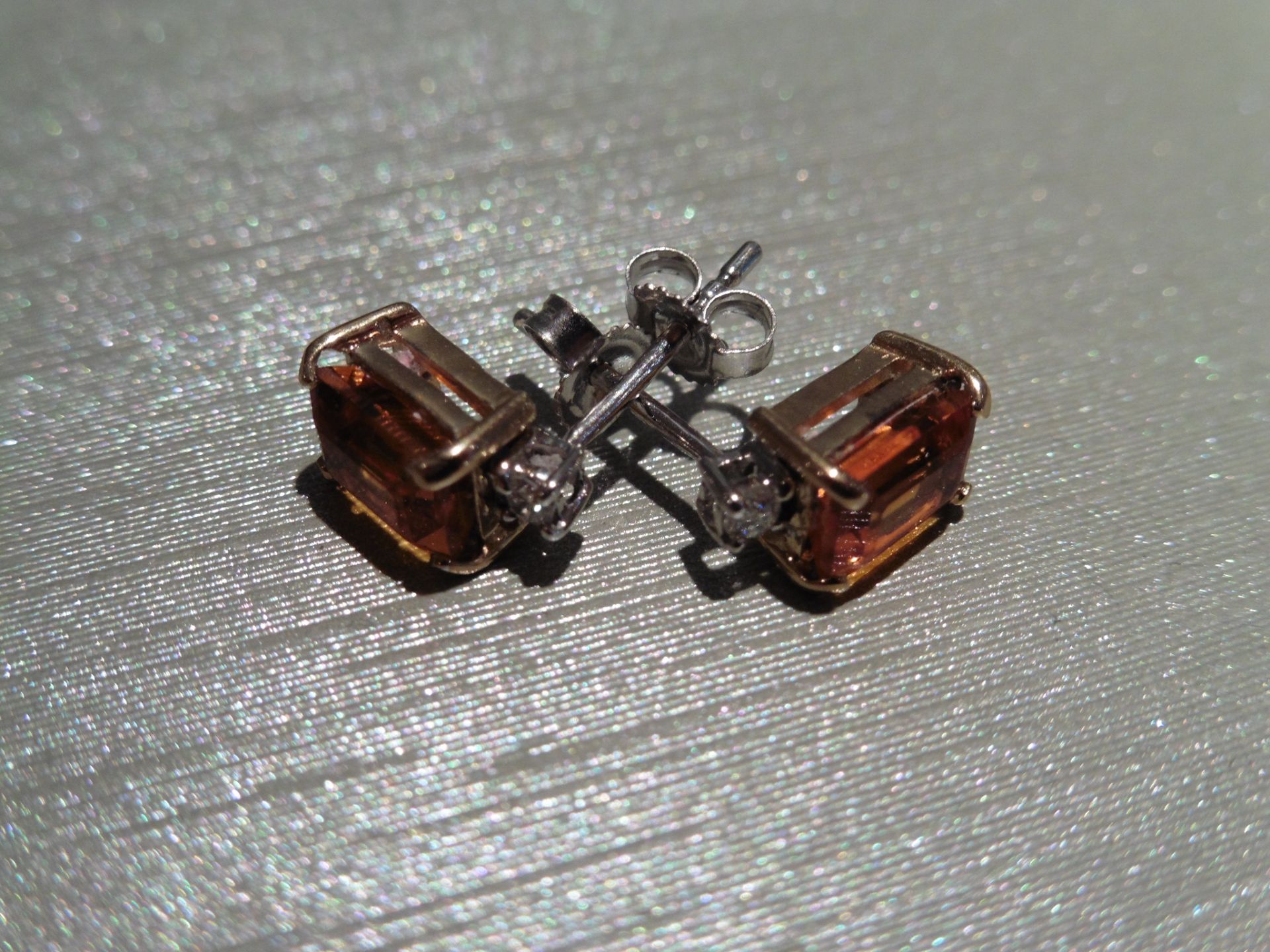 Brand new 9ct gold citrine and diamond earrings. Each set with an emerald cut citrine weighing 1. - Image 3 of 3