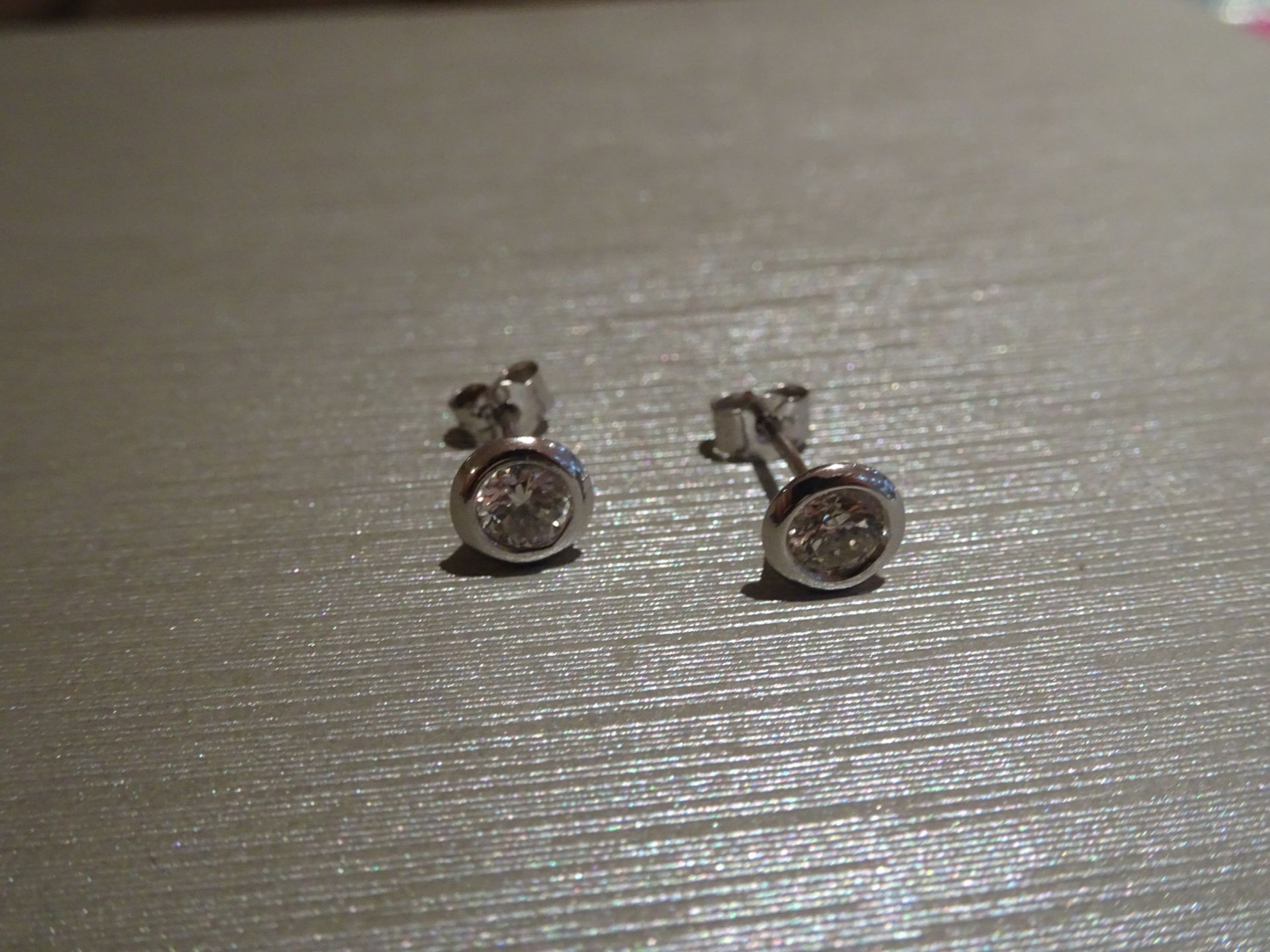 Brand new 18ct white gold diamond solitaire style earrings each set with a brilliant cut diamond, - Image 3 of 3