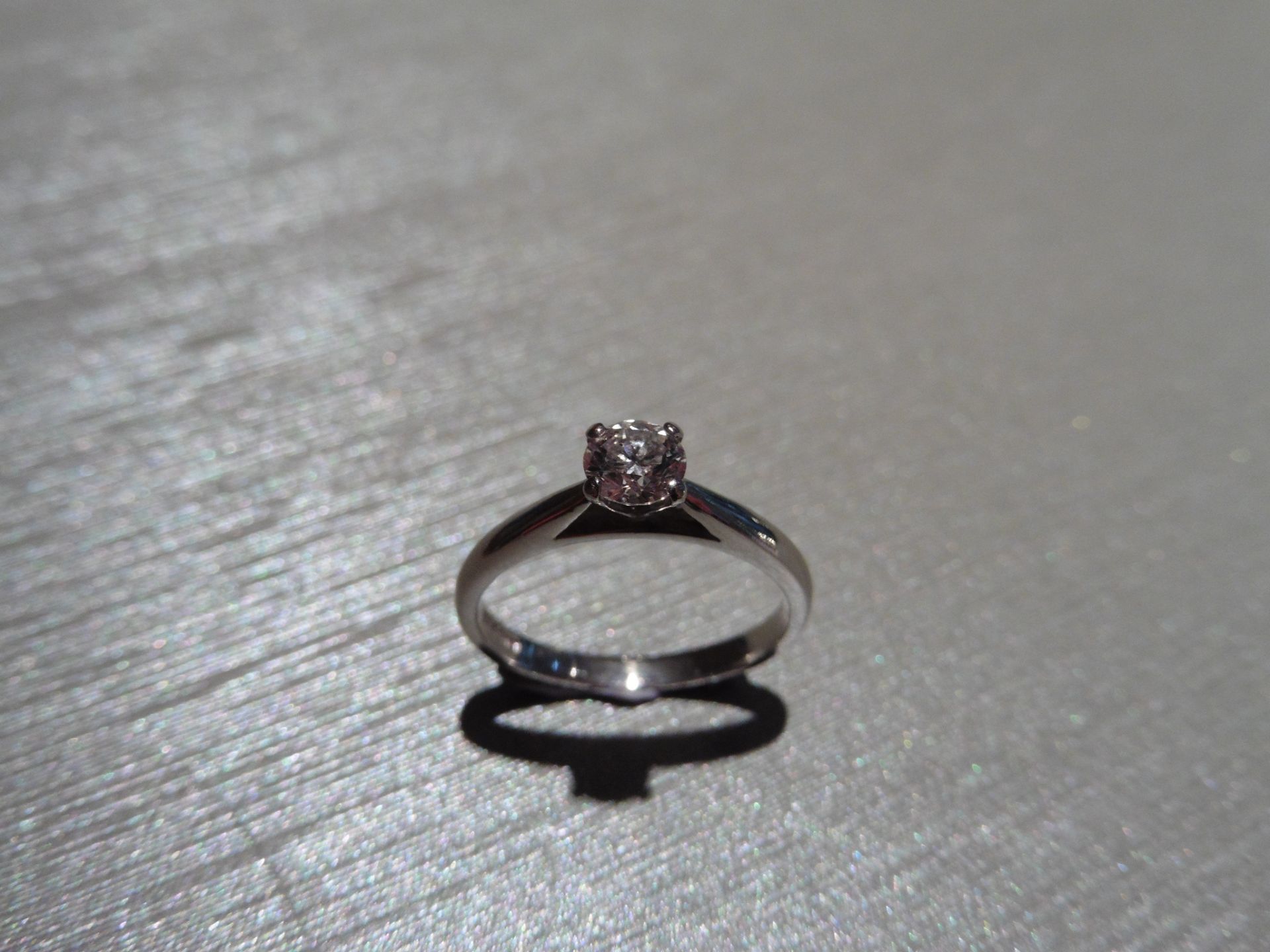 Brand new Platinum diamond solitaire ring set with a 0.40ct brilliant cut diamond, F colour and P1