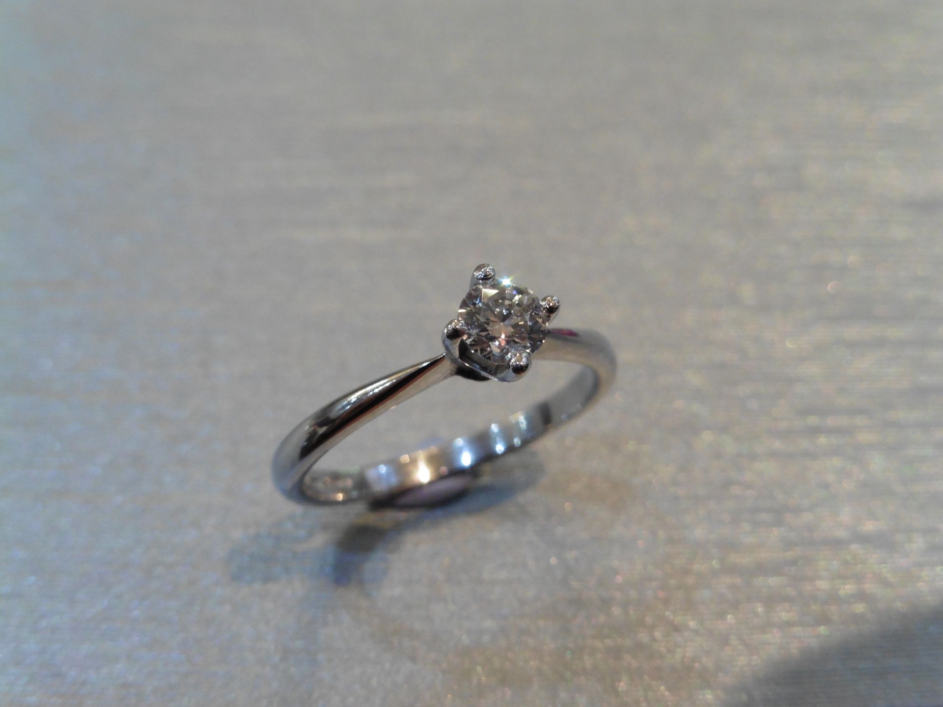 Brand new Platinum diamond solitaire ring set with a 0.30ct brilliant cut diamond, H colour and