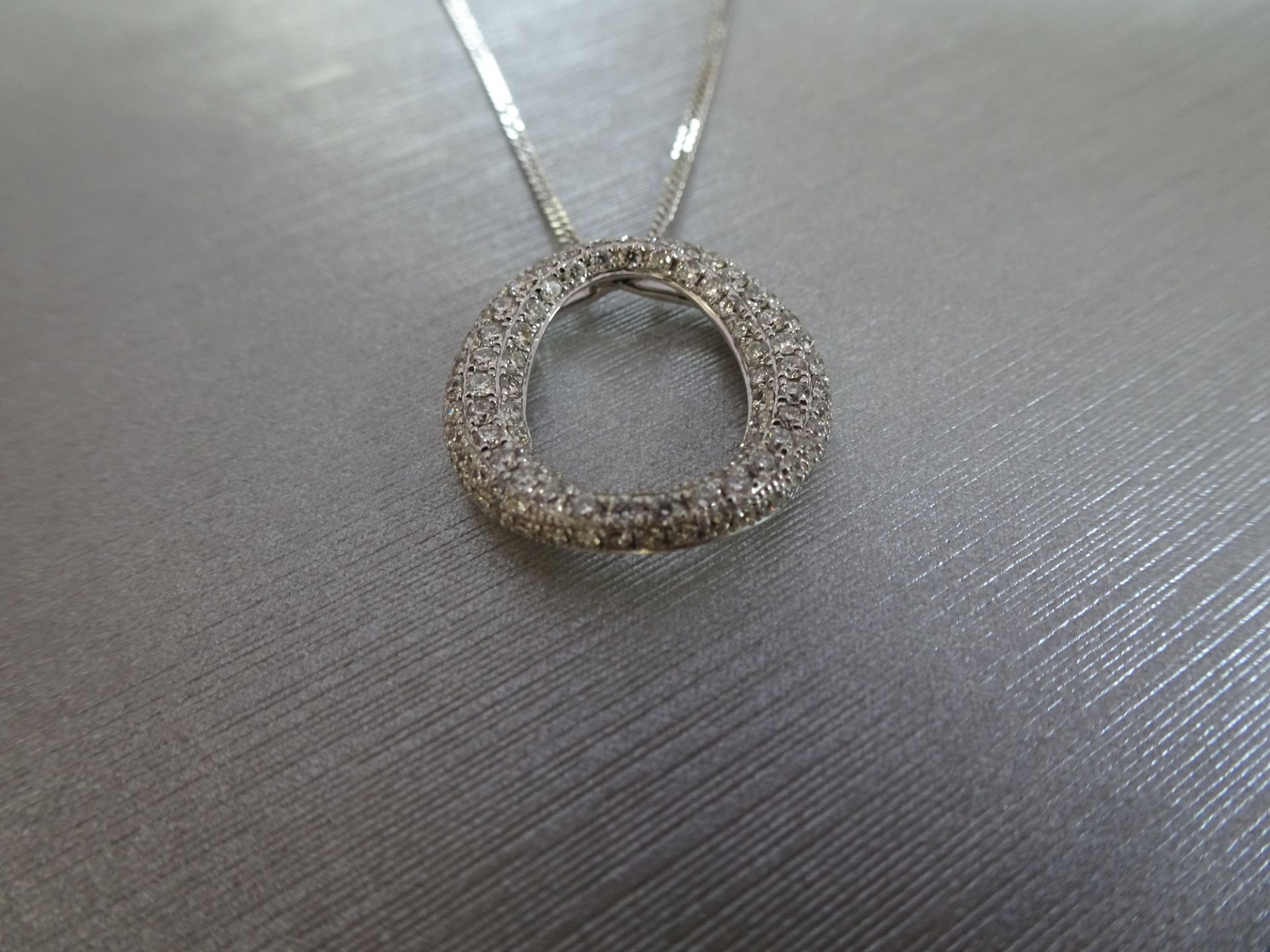 18ct white gold diamond set pendant in an 'o' design. Set with tiny brilliant cut diamonds - Image 5 of 5