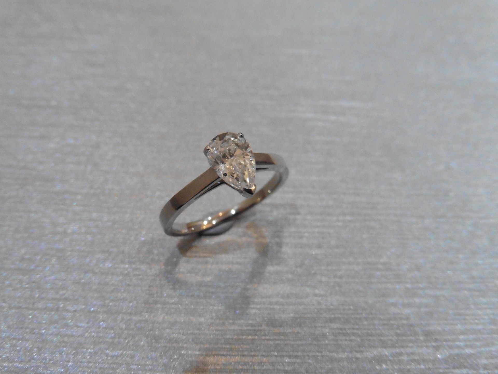 Brand new Platinum diamond solitaire ring. Set with a 1.10ct pear shape diamond (measures 8.67mm x - Image 4 of 6