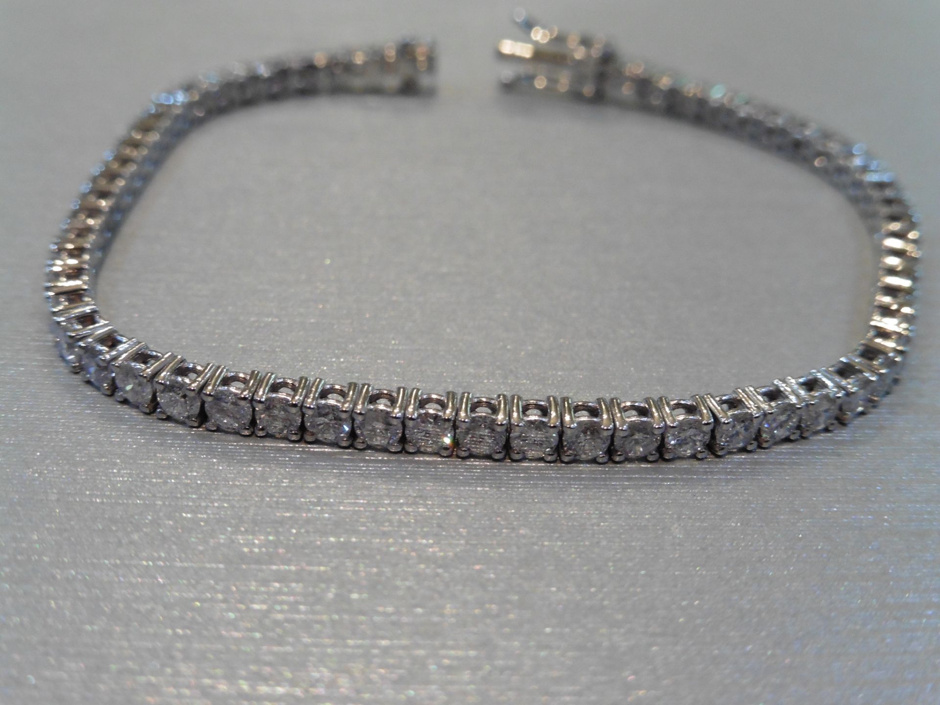 Brand new 18ct white gold tennis bracelet set with brilliant cut diamonds of H/I colour weighing 3.