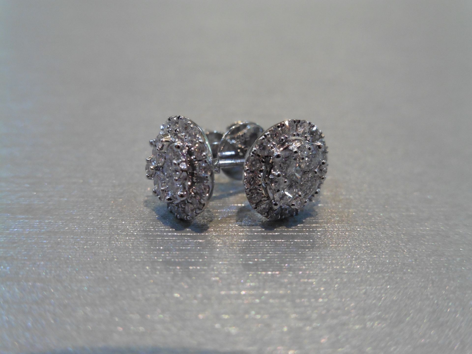 Brand new 14ct white gold diamond earrings. Each are illusion set with small brilliant cut - Image 3 of 3