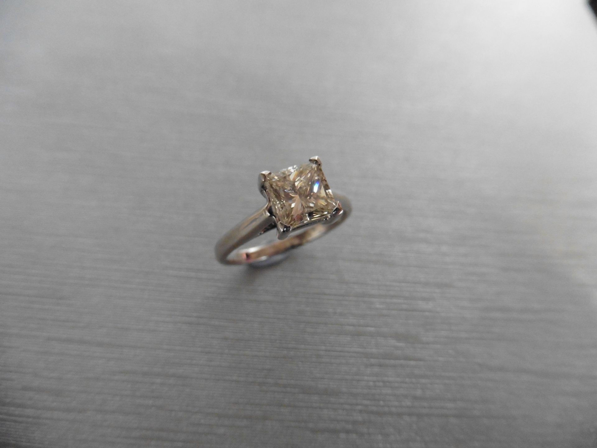 Brand new 18ct gold diamond solitaire ring set with a princess cut diamond weighing 1.30ct. J