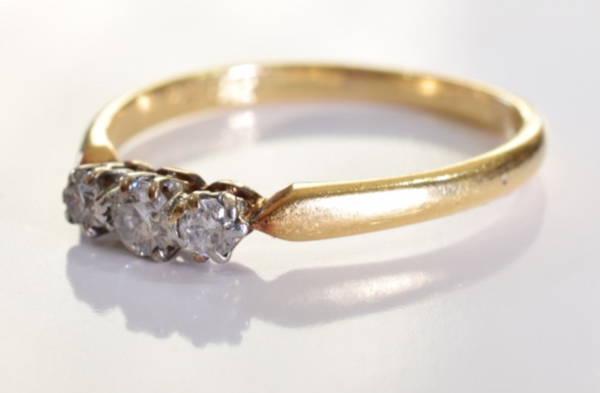 An 18ct Gold & Diamond Ring, Three graduated brilliant cut diamonds, set in 18ct gold. 2.4grms - - Image 3 of 4