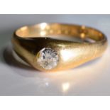 A gentleman's early 20th century 18ct gold diamond single-stone ring. The brilliant-cut diamond, (