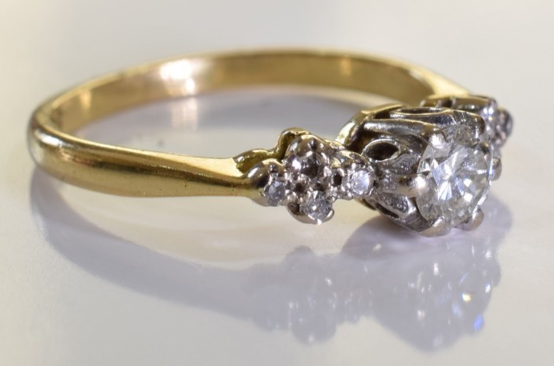 An 18ct gold diamond single-stone ring. The brilliant-cut diamond, raised to the single-cut - Image 3 of 3