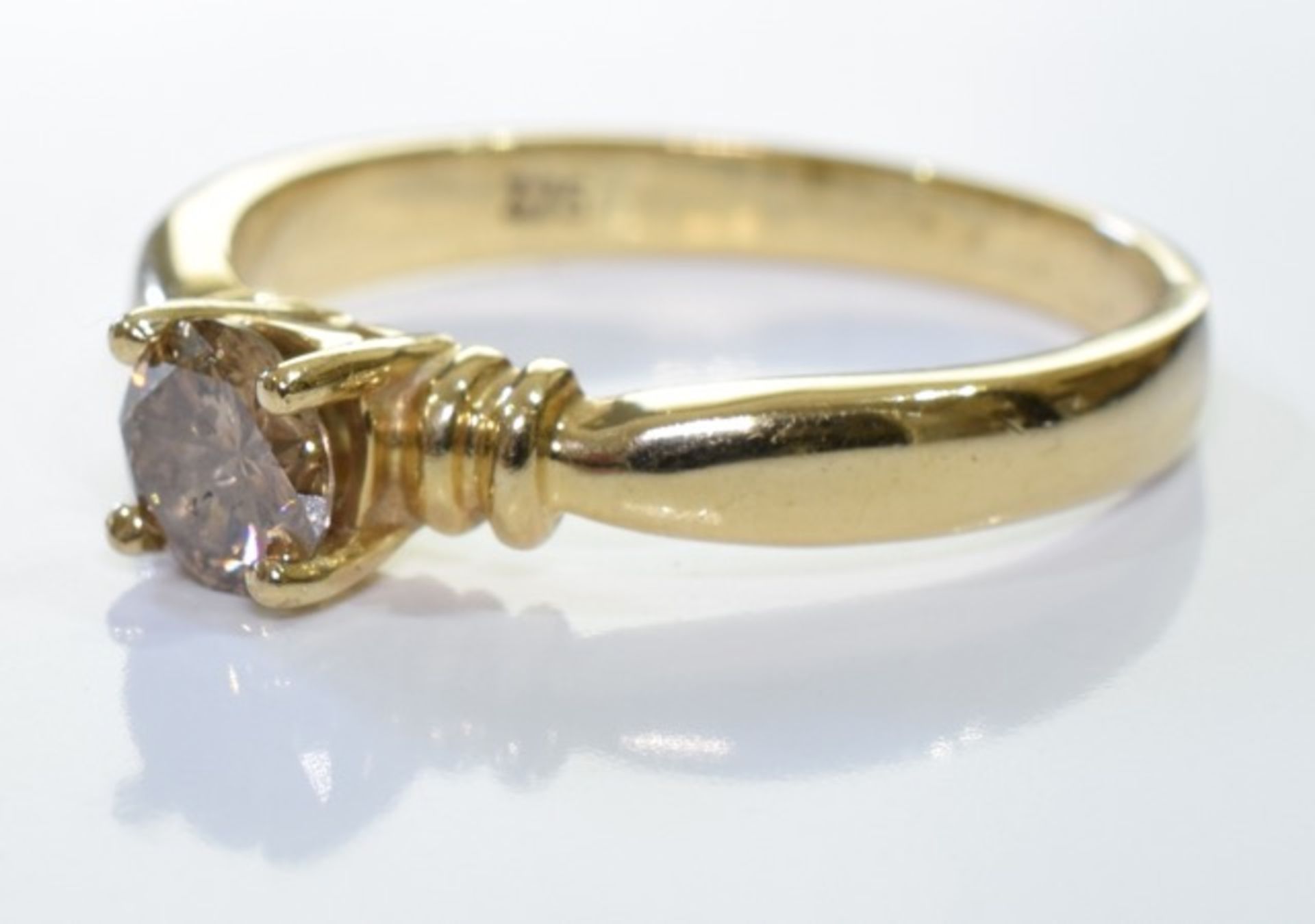 A 9ct gold chocolate diamond ring. A 'Chocolate' brilliant-cut diamond single-stone ring, - Image 3 of 3