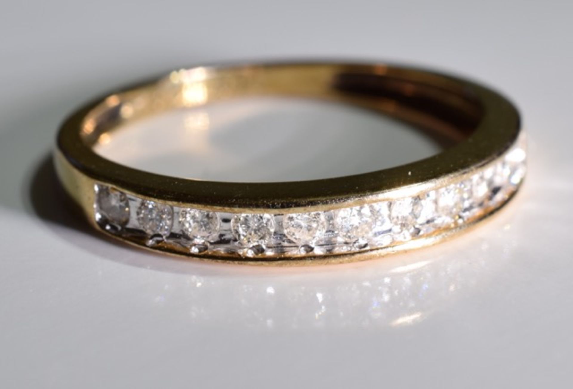 A 9ct gold half eternity ring, with around .33ct of diamonds - size p/q - Image 2 of 4