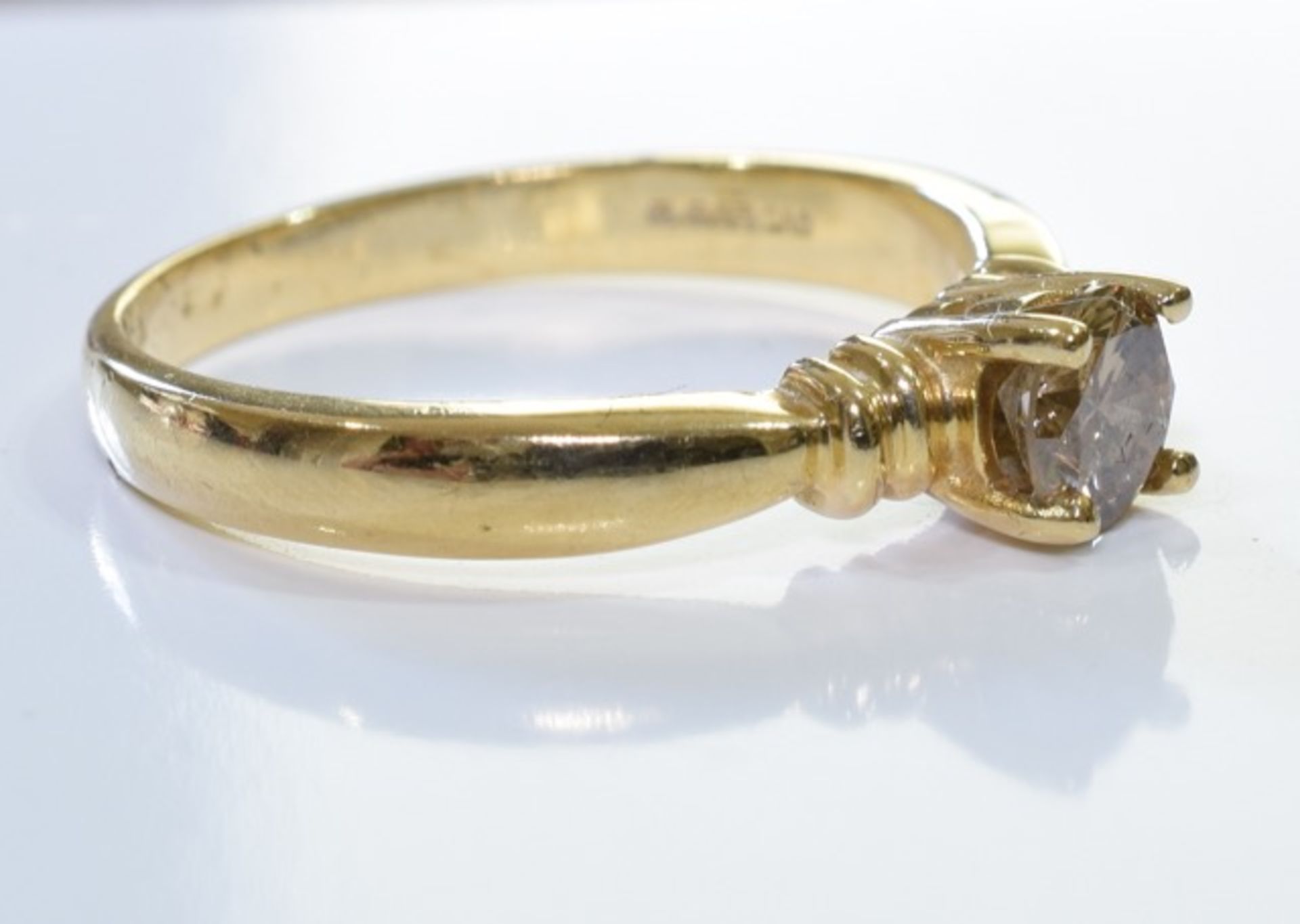 A 9ct gold chocolate diamond ring. A 'Chocolate' brilliant-cut diamond single-stone ring, - Image 2 of 3