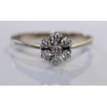A 14ct Gold Diamond flower cluster ring with around .28 carats of diamonds - size m/n