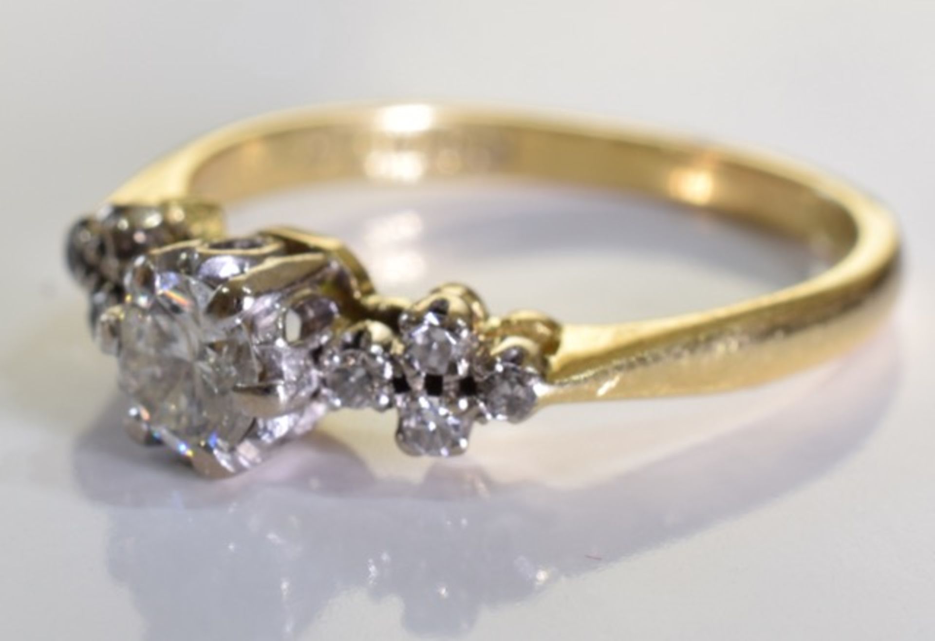 An 18ct gold diamond single-stone ring. The brilliant-cut diamond, raised to the single-cut - Image 2 of 3