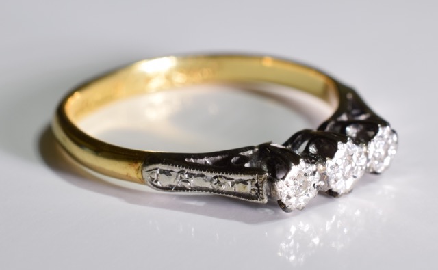 A 9ct gold and diamond ring, 3 graduated diamonds set side by side in a 9ct gold ring. 1.6 grms - - Image 3 of 3