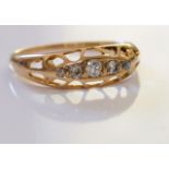 A 18ct gold diamond ring. 5 old-cut diamond Graduated diamonds, set in 18ct gold. Approximated