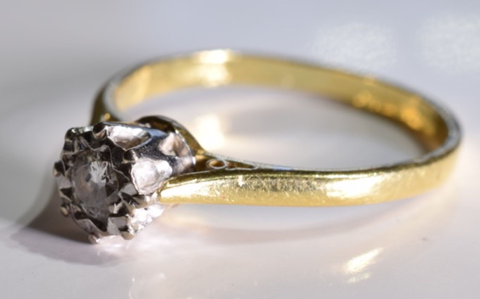 An 18ct Gold Diamond Single stone ring, The brilliant cut diamond in an illusion setting within a - Image 2 of 3
