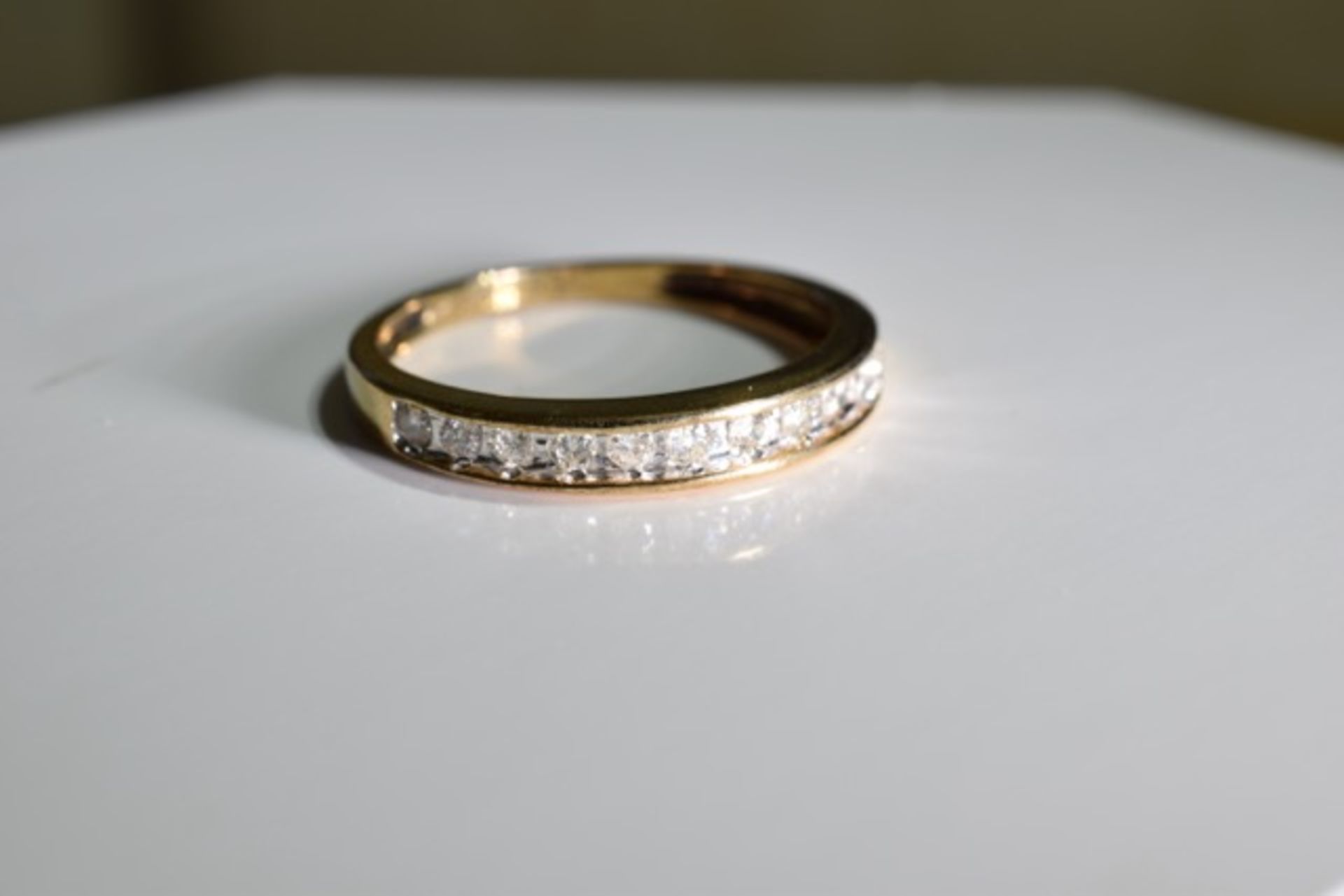 A 9ct gold half eternity ring, with around .33ct of diamonds - size p/q - Image 4 of 4