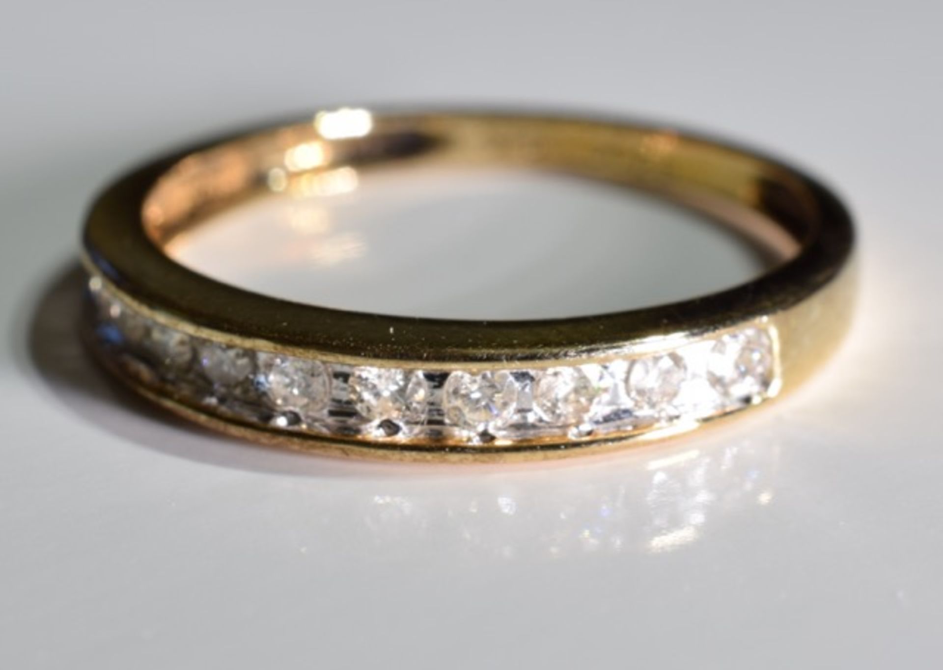 A 9ct gold half eternity ring, with around .33ct of diamonds - size p/q - Image 3 of 4