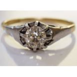 An early 20th century 18ct gold diamond single-stone ring. The old cut diamond, to the tapered
