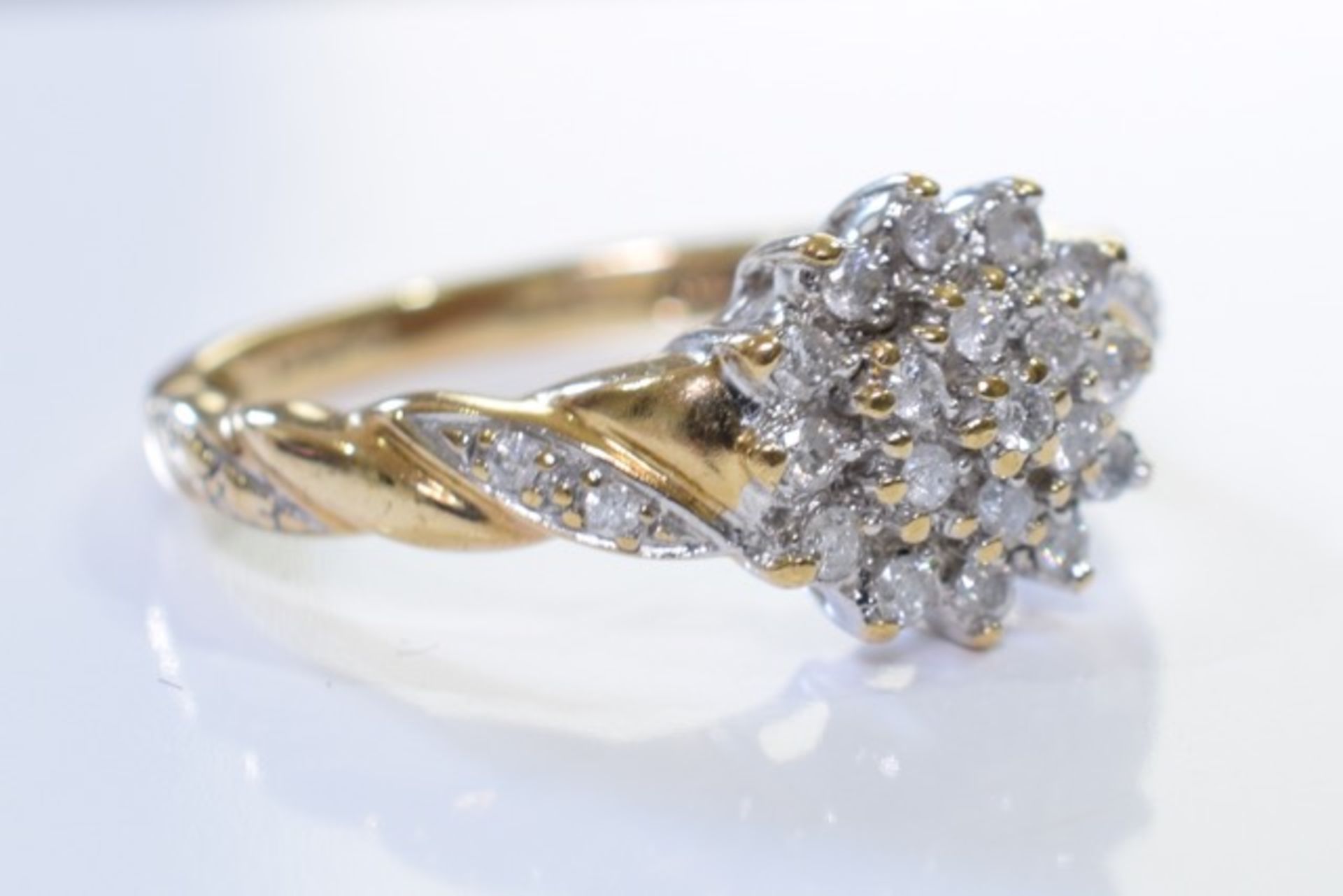A 9ct Gold Diamond cluster ring. - Image 2 of 3