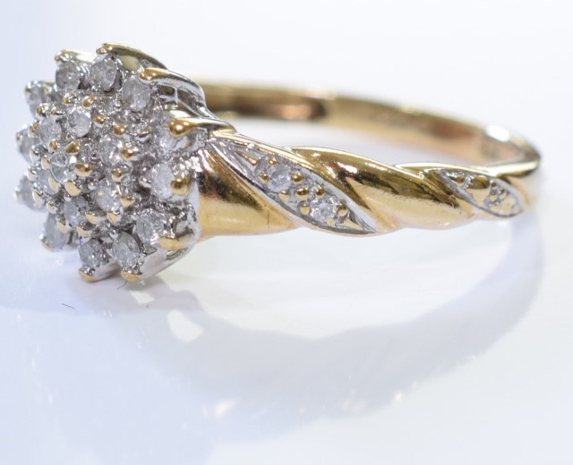 A 9ct Gold Diamond cluster ring. - Image 3 of 3