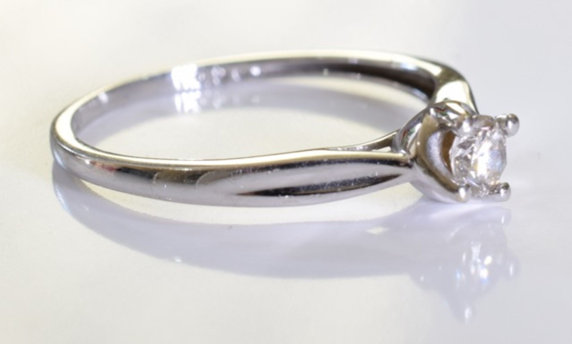 A brilliant cut single round diamond ring set in 9ct white gold. - Image 4 of 4