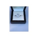 6.04 ct Pear-cut Diamond Solitaire Ring set in 18k White Gold band.