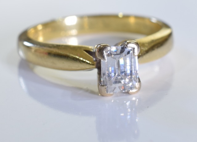 A 18ct Gold Emerald cut diamond ring. Size J. The diamond is of very good quality, clear without - Image 2 of 5