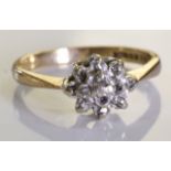 A 9ct gold diamond cluster ring. 2.0 grms - size M