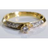 An 18ct gold diamond solitaire ring. A brilliant cut diamond ring set in 18ct gold. 2.6 grms -